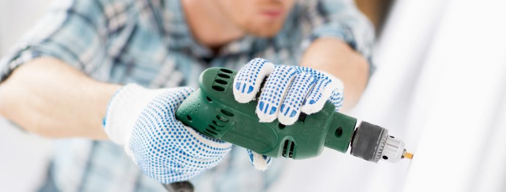 man drilling the wall.jpg